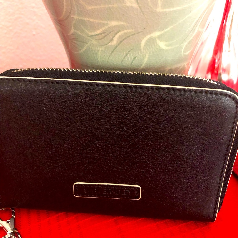 Vera Bradley zip around black Faux leather wallet, 4 card slots with two slits.